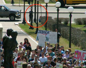 Michele_Bachmann_hiding_at_gay_rights_rally